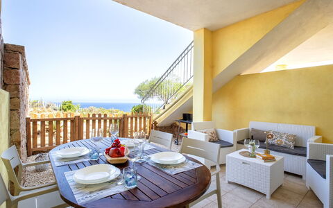 Sunset House Isola Rossa: Blue, Balcony, Handrail, Apartment, Fence, Sea, Resort, Condominium, Swimming Pool, Hotel