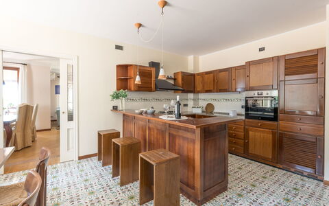 Villa Althea: Furniture, Interior Design, Flooring, Cabinetry, Countertop, Wood, Kitchen, Floor, Ceiling, Cupboard