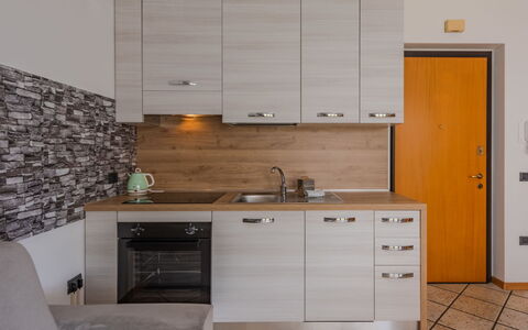 Michelon: Interior Design, Furniture, Kitchen, Flooring, Wood, Countertop, Cabinetry, Kitchen Appliance, Floor, Major Appliance