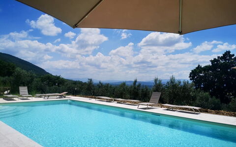 Villa Santa Chiara: Swimming Pool, Outdoor Furniture, Leisure, Resort, Hill, Sunlounger, Umbrella, Mountain Range, Eco Hotel, Vacation