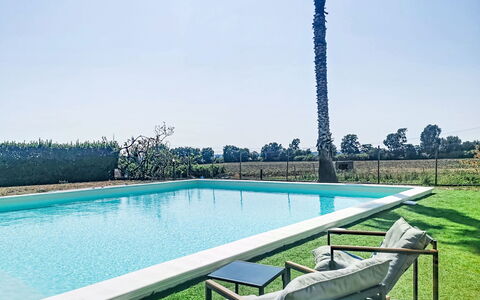 La Perla di Aprilia: Blue, Swimming Pool, Resort, Shade, Outdoor Furniture, Leisure, Lawn, Landscaping, Estate, Eco Hotel