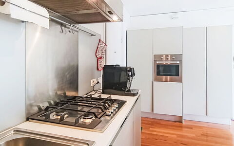 Caminito: Kitchen Appliance, Kitchen, Countertop, Major Appliance, Kitchen Stove, Flooring, Home Appliance, Interior Design, Wood, Stove
