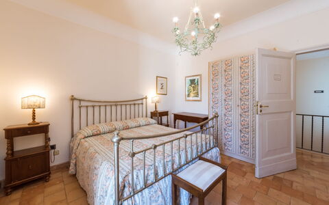 Borgo Colle Ridente 13: Bed, Interior Design, Bedroom, Furniture, Flooring, Bed Sheet, Ceiling, Floor, Bedding, Room
