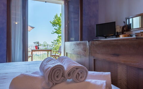 Casale Verdicchio 10+2: Balcony, Outdoor Furniture, Chair, Porch, Hardwood, Wood Stain, Resort, Houseplant, Eco Hotel, Hotel