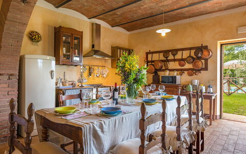 Podere Bagnolo 8: Furniture, Interior Design, Table, Chair, Kitchen & Dining Room Table, Dining Room, Flooring, Lighting, Room, Home