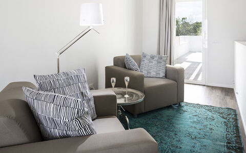 Portoverde Beach Villa 12: Furniture, Interior Design, Couch, Flooring, Floor, Wall, Living Room, Room, Home, Apartment