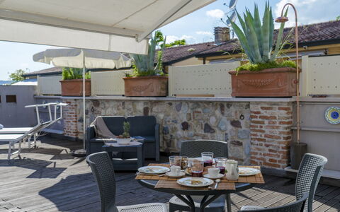 Arcimboldo House 2+2: Furniture, Flowerpot, Outdoor Furniture, Chair, Apartment, Houseplant, Outdoor Table, Shade, Balcony, Patio