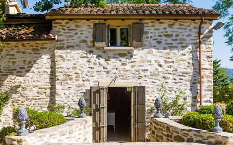 Il Castellaccio 8: Wall, Shrub, House, Door, Home, Cottage, Stone Wall, Spring, Garden, Estate