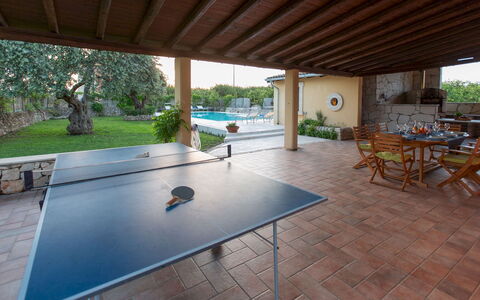 Il Giardino dei Limoni 8: Furniture, Flooring, Floor, Swimming Pool, Resort, Table, Interior Design, Chair, Shade, Tile