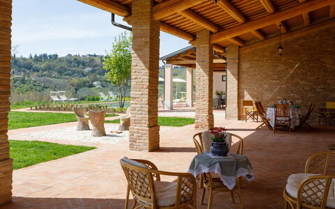 Ca' Pellicciano 8: Furniture, Chair, Porch, Outdoor Furniture, Shade, Column, Eco Hotel, Garden, Patio, Estate