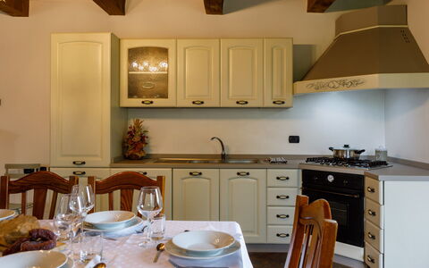 Villa Agostini 10: Kitchen, Interior Design, Furniture, Wood, Countertop, Kitchen Appliance, Cabinetry, Major Appliance, Flooring, Ceiling
