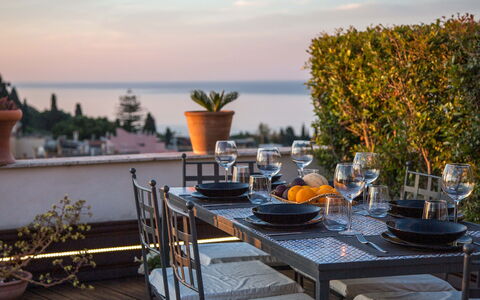 Attico Giafari 6: Furniture, Table, Chair, Sea, Outdoor Furniture, Kitchen & Dining Room Table, Shade, Flowerpot, Outdoor Table, Ocean