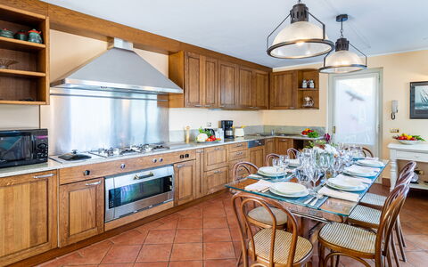 Villa la Dolce 8: Kitchen, Furniture, Interior Design, Countertop, Flooring, Cabinetry, Kitchen Appliance, Wood, Ceiling, Major Appliance