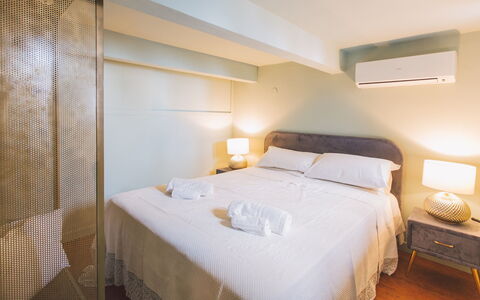Torre Pirandello 6: Bed, Bedroom, Interior Design, Floor, Bedding, Bed Sheet, Flooring, Wood, Furniture, Room