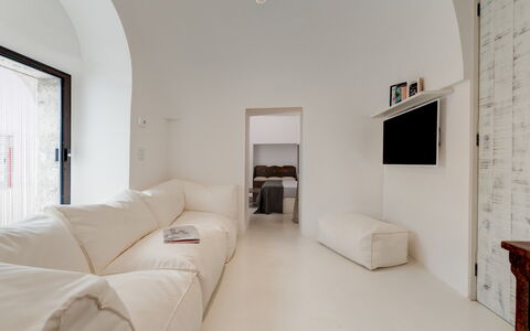 Trullo Santa Pazienza 6+3: Interior Design, Flooring, Floor, Furniture, Ceiling, Couch, Room, Living Room, Apartment, Home