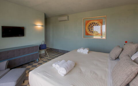 Villa Passo degli Aironi 12: Floor, Flooring, Furniture, Bedroom, Swimming Pool, Hotel, Chair, Resort, Bed, Bedding