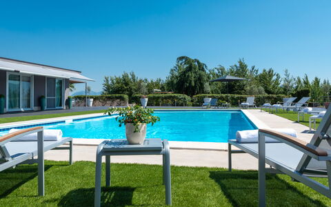Villa Atmosfere 8: Swimming Pool, Resort, Outdoor Furniture, Shade, Garden, Landscaping, Lawn, Chair, Eco Hotel, Yard
