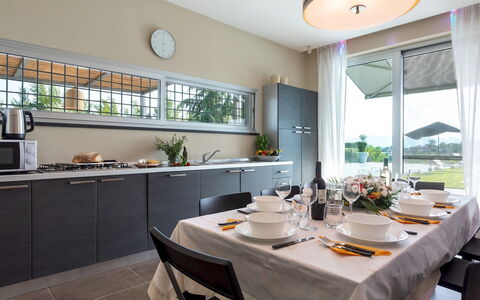 Villa Atmosfere 8: Interior Design, Kitchen, Furniture, Lighting, Home, Flooring, Countertop, Ceiling, Chair, Kitchen Appliance