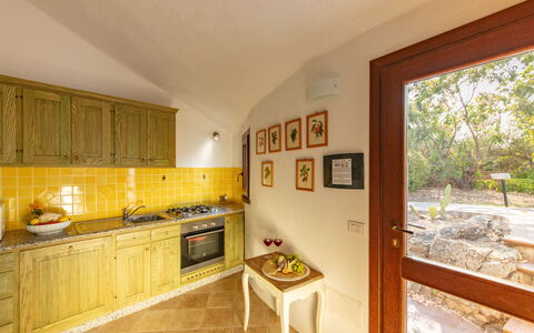 Villa Isa 6: Interior Design, Wood, Flooring, Yellow, Ceiling, Furniture, Floor, Room, Countertop, Kitchen
