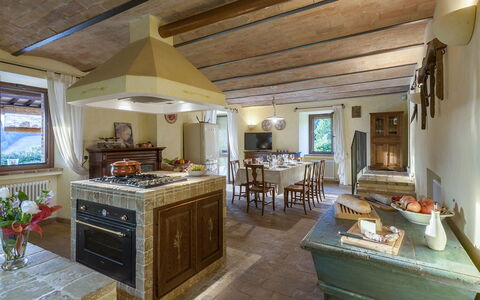 Villa Il Baiocco 8: Furniture, Wood, Interior Design, Table, Home, Flooring, Lighting, Room, Ceiling, Kitchen