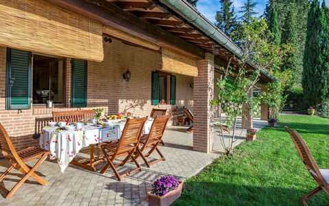 Villa Il Baiocco 8: Furniture, Outdoor Furniture, Outdoor Table, Shade, Cottage, Eco Hotel, Chair, Porch, Flowerpot, Houseplant