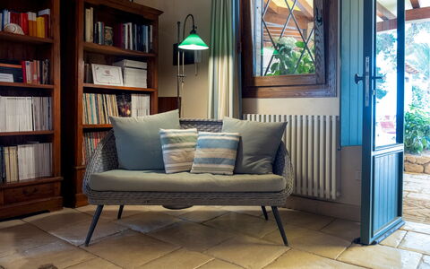Villa Terra del Sole 8: Furniture, Cushion, Throw Pillow, Couch, Pillow, Living Room, Comfort, Linens, Houseplant
