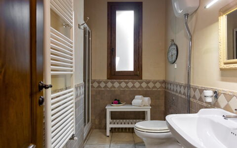 Villa Terra del Sole 8: Flooring, Interior Design, Floor, Wood, Plumbing Fixture, Bathroom, Bathroom Sink, Furniture, Sink, Lighting