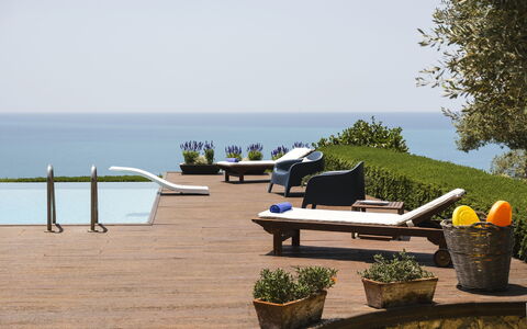 Villa Terra del Sole 8: Water, Furniture, Body Of Water, Outdoor Furniture, Sea, Ocean, Resort, Coastal And Oceanic Landforms, Chair, Shade