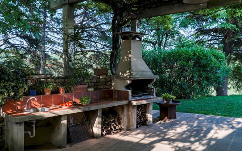 Villa degli Ulivi 8: Garden, Backyard, Shade, Landscaping, Outdoor Structure, Flowerpot, Lawn, Design, Yard, Patio