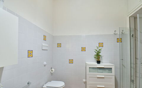 Villa Afrodite 8: Wall, Flooring, Interior Design, Floor, Yellow, Tile, Plumbing Fixture, Bathroom, Room, Plumbing