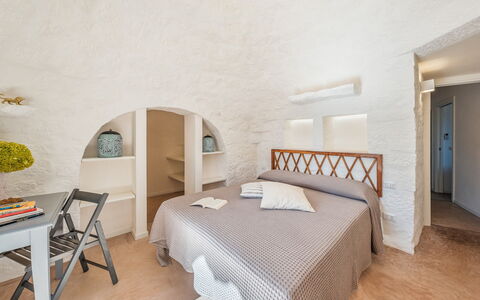 Borgo Dell'Agrumeto 8: Wall, Architecture, Bedroom, Home, Ceiling, Floor, Apartment, Bed, Bedding, Bed Sheet
