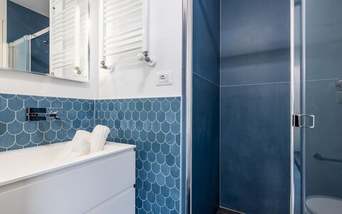 Villa Ristola 6: Blue, Flooring, Interior Design, Floor, Plumbing Fixture, Tile, Bathroom, Plumbing, Bathroom Cabinet