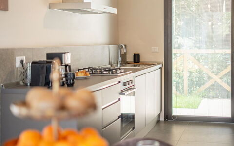 Marea 8: Kitchen, Countertop, Furniture, Kitchen Appliance, Interior Design, Major Appliance, Flooring, Wood, Cabinetry, Home Appliance
