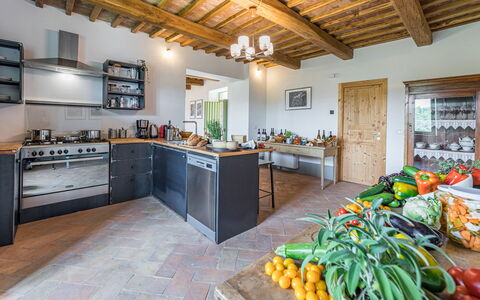 Villa a Casa di Giovanni 12: Furniture, Wood, Flooring, Kitchen, Interior Design, Home, Countertop, Floor, Ceiling, Chair