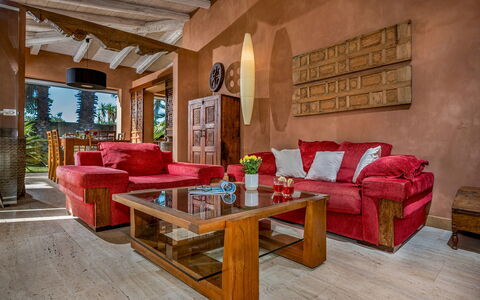 Villa Antura 4: Furniture, Couch, Interior Design, Flooring, Wood, Living Room, Floor, Room, Chair, Wood Flooring