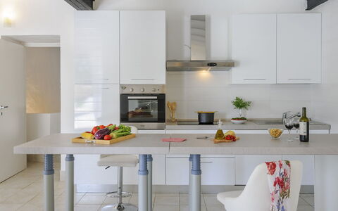 Villa Ardente 12+1: Furniture, Kitchen, Countertop, Interior Design, Cabinetry, Kitchen Appliance, Flooring, Wood, Floor, Light Fixture