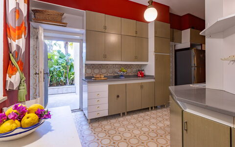 Villa Carina 12: Interior Design, Kitchen, Flooring, Furniture, Countertop, Floor, Wood, Cabinetry, Major Appliance, Lighting