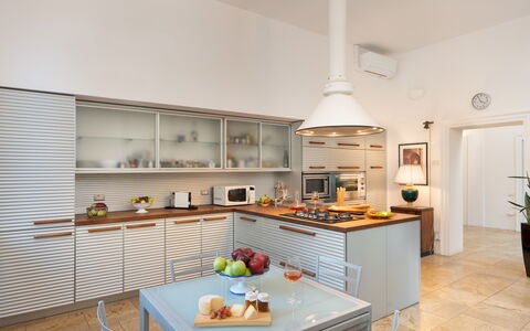Villa Laguna 10: Kitchen, Interior Design, Countertop, Furniture, Kitchen Appliance, Flooring, Cabinetry, Ceiling, Lighting, Major Appliance