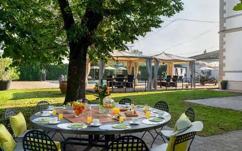 Villa Laguna 10: Furniture, Table, Chair, Shade, Outdoor Furniture, Restaurant, Garden, Outdoor Table, Outdoor Structure, Yard