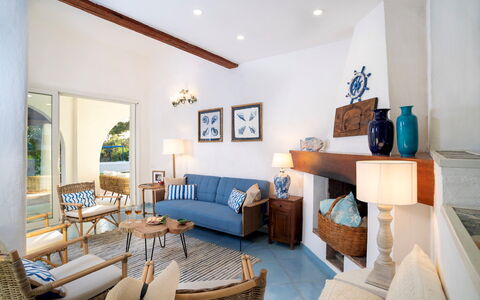 Villa Sandra 10: Furniture, Interior Design, Flooring, Wood, Couch, Floor, Table, Chair, Lighting, Living Room