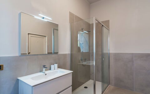 Villa la Cicaliera 10: Flooring, Floor, Bathroom, Plumbing Fixture, Interior Design, Plumbing, Tap, Mirror, Room, Bathroom Cabinet