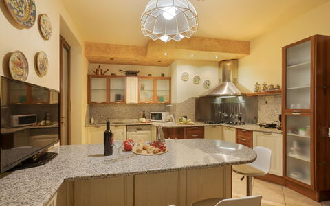 Villa Valchero 12: Kitchen, Furniture, Countertop, Interior Design, Kitchen Appliance, Cabinetry, Flooring, Light Fixture, Wood, Ceiling