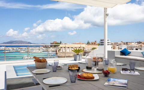 Dimora Egadina Giovanni 4+4: Furniture, Table, Chair, Outdoor Furniture, Sea, Boat, Shade, Restaurant, Watercraft, Resort