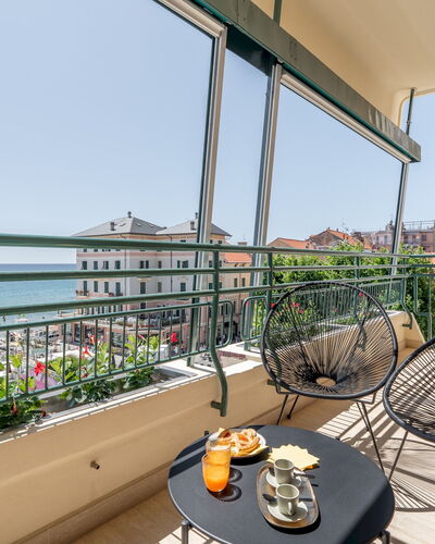 Dimora Mareblu 6: Balcony, Apartment, Chair, Outdoor Furniture, Houseplant, Outdoor Table, Resort, Hotel, Coffee Table, Eco Hotel