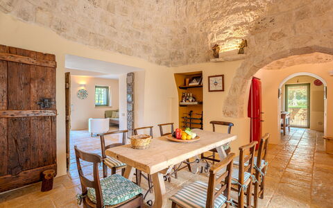 Trullo Magnifico 8: Furniture, Wall, Interior Design, Flooring, Table, Chair, Kitchen & Dining Room Table, Ceiling, Dining Room, Floor