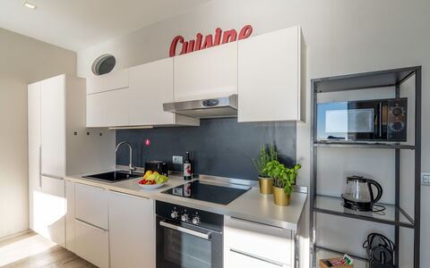 Aurora 2+2: Kitchen, Kitchen Appliance, Countertop, Cabinetry, Major Appliance, Interior Design, Kitchen Stove, Furniture, Home Appliance, Flooring