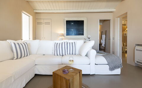 Baia L'Aura 8: Furniture, Interior Design, Couch, Flooring, Living Room, Floor, Wood, Room, Ceiling, Textile