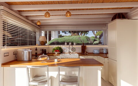 Baia L'Aura 8: Furniture, Interior Design, Wood, Countertop, Kitchen, Flooring, Ceiling, Lighting, Floor, Cabinetry