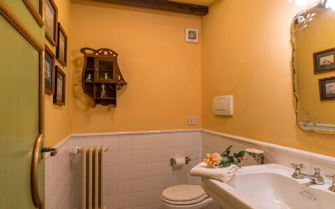 Montepietraia e San Martino 18: Wall, Interior Design, Yellow, Plumbing Fixture, Bathroom, Bathroom Sink, Lighting, Tap, Flooring, Plumbing