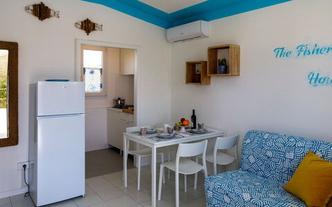 Casetta del Pescatore 4: Furniture, Chair, Home, Kitchen & Dining Room Table, Wood Stain, Houseplant, Paint, Outdoor Furniture, Balcony, Coffee Table